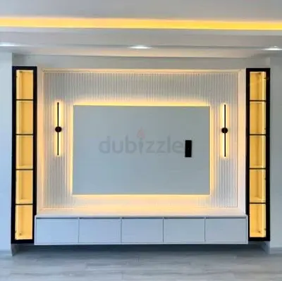 Custom built-in entertainment center with LED backlighting and display cabinets