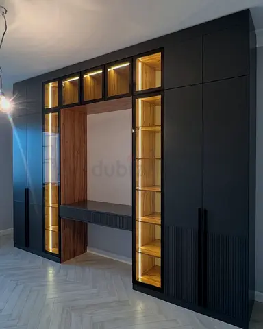 Custom Built-in Black Wardrobe with Illuminated Display Shelves