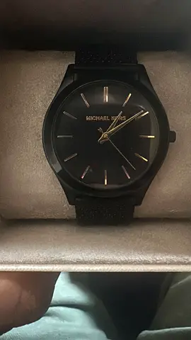 Watch Michael Kors MK8607 Slim Runway, 44mm, black stainless steel with gold-tone markers.