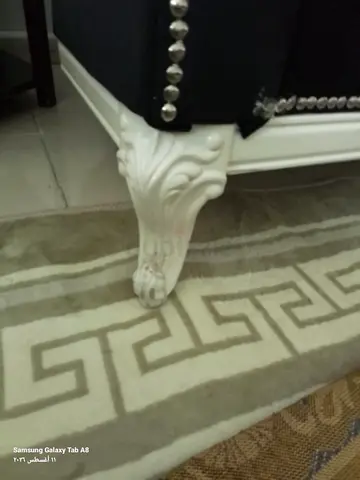 Classic Tufted Sofa with Ornate White Legs