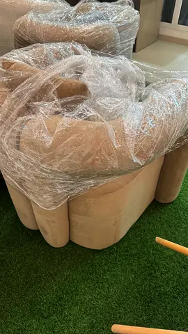 Beige Curved Upholstered Armchair — Good Condition