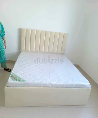 Queen upholstered bed frame with headboard and mattress - cream