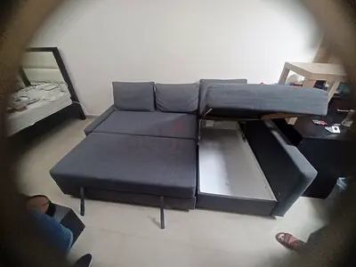 Grey L-shaped Sofa with Storage — Good Condition