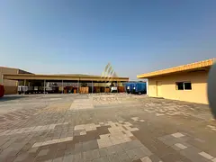 Prime 16,000 Sq. Ft. Open Yard with Office & Shed for Rent in Al Sajaa Industrial Area