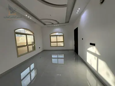 Second hand villa 5 master bedrooms spacious majlis two living rooms maids room storage room and large roof terrace New finishes and free maintenance