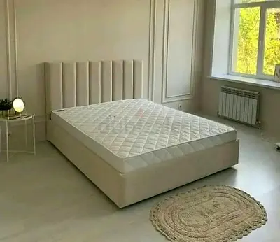 Queen upholstered bed frame with mattress - neutral beige