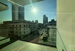 Modern 1BR Apartment | Spacious layout | City & Pool Views | Balcony