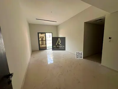 For annual rent - Al Nuaimiya 1 Two-bedroom apartment with a living room, built-in wardrobes, and three bathrooms