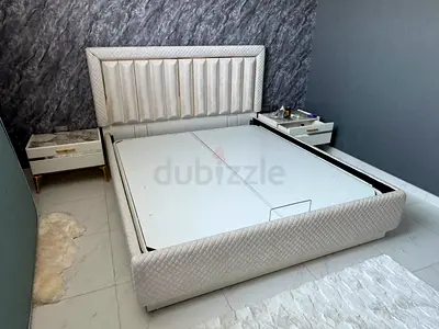 Available high quality from home center bed with side table and dressing table like a new