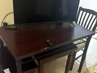 Used dark wood dining table with two chairs - good for kitchen or study