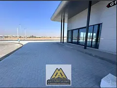 Commercial showroom in Al Bahia, Ajman, 1,180 sq ft, free zone license, suitable for restaurants and