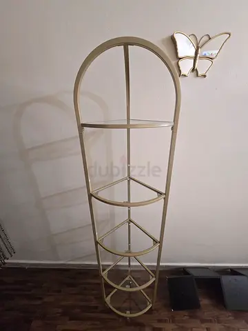 Golden glass corner shelf stylish