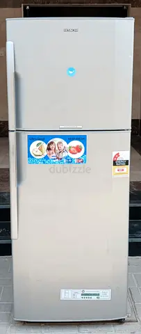Brand Hitachi Refrigerator, color silver, with 365 litres, condition working perfectly.