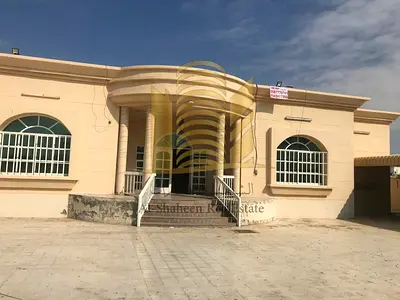 Ground floor villa for rent in Ajman Al Jurf 1 An area of ​​15 thousand square feet 4 rooms + majlis + hall Dining room Places for agriculture Ver