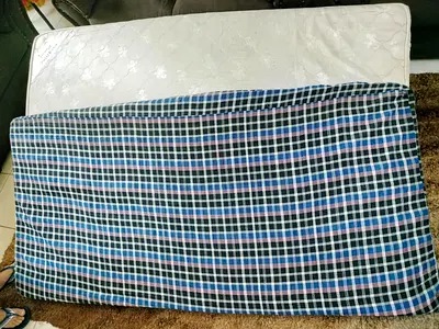 Single mattress with removable checkered cover - very good condition
