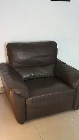 Dark brown leather single armchair - comfortable used condition