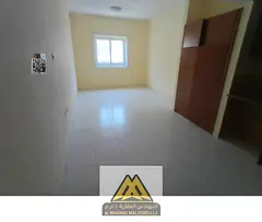 Large studio in Al Rashidiya 3, central AC, built-in wardrobes, free maintenance by owner, AED 20,0