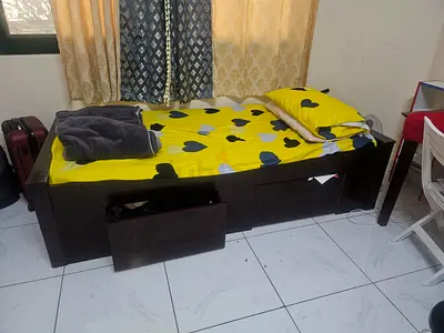 Single wooden bed with built-in drawers - dark brown