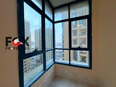 For annual rent in Al Khor Towers, Al Rashidiya 1: luxury 2-bedroom apartment with a maid’s room,