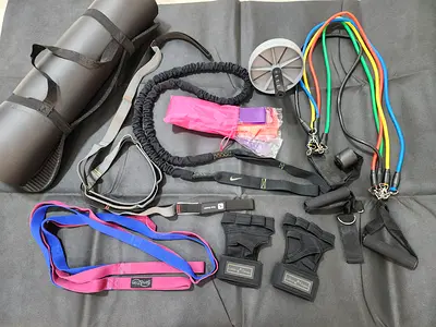 8pcs Fitness Equipment Set including yoga mat, fitness, ab roller, resistant tubes, stratching bands