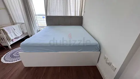 White storage bed with mattress - good condition