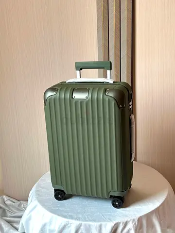 Rimowa Distinct cabin in olive green carry on suitcase