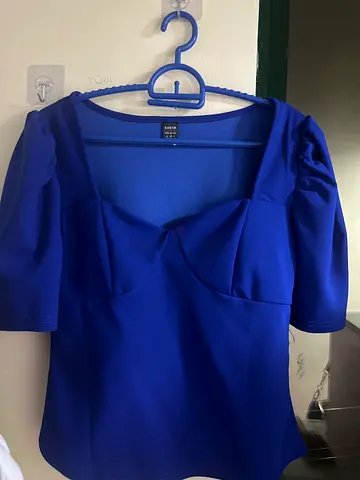 Blue women's blouse/top, size M, good pre-owned condition