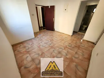 Two-bedroom apartment with a living room for annual rent in Ajman Corniche Private and spacious rooftop | Second row from the Corniche | One bathroom