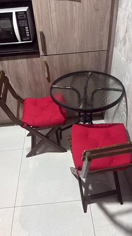 Wooden Outdoor Bistro Table with 2 Red-Cushioned Folding Chairs