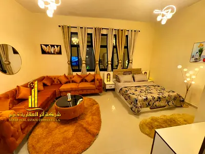 For monthly rent in Ajman - Studio apartment semi-detached kitchen, open view, fully furnished new with elegant furniture and a fully equipped kitchen