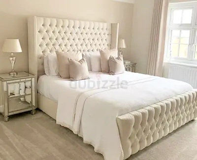 King size tufted upholstered bed with padded headboard and footboard - cream