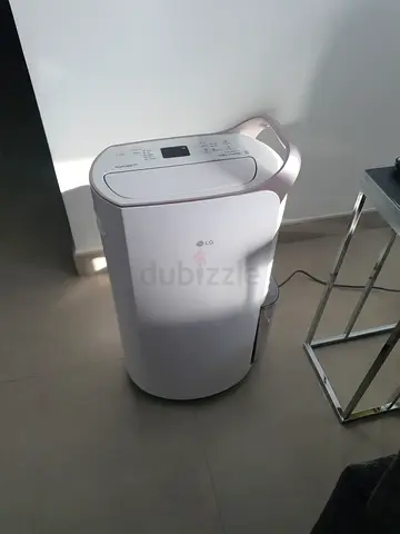 LG Portable Dehumidifier / Air Purifier - Compact, White (Bramd new)