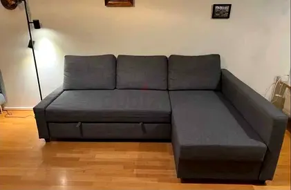Grey L-shaped Sofa with Storage - Good Condition