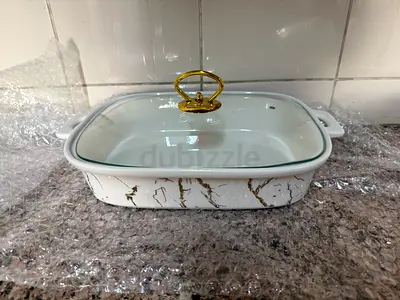 White ceramic/enamel casserole dish with glass lid
