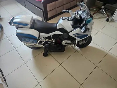 Kids BMW Police Electric Ride-On Motorcycle first come first fully working condition charging