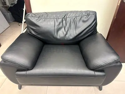 Comfortable Black Leather Armchair – Good Condition