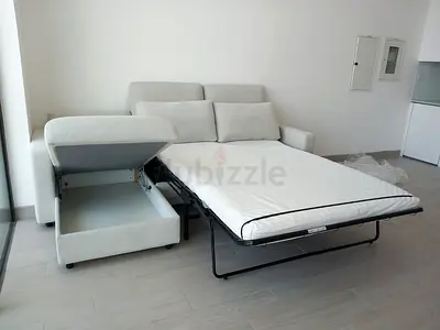 fabric sofa bed with storage - pulls out to double bed
