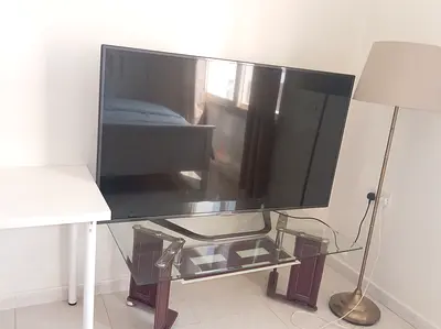 Modern Glass TV Stand with Storage Shelf