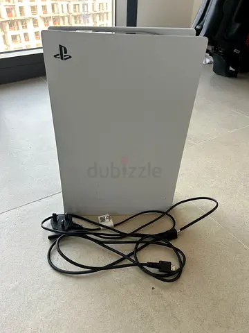 Sony PlayStation 5 with 2 controllers and 3 games