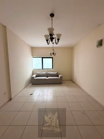 For annual rent in Al Majaz 3 near Al Qasba a spacious two bedroom apartment with living room two b