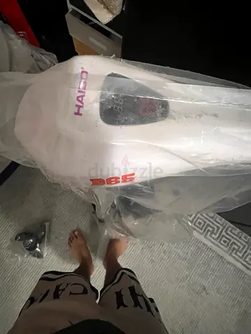 Kayak, with motor battery and charger