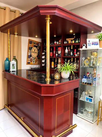Wooden Home Bar with Overhead Canopy and Marble Top