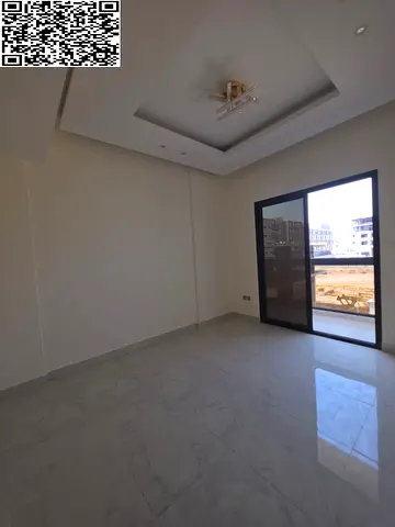 Two bedrooms and a living room 🚿 2 bathrooms 🌿 Balcony 🍳 Kitchen 📐 Spacious layout in Al Jurf 3