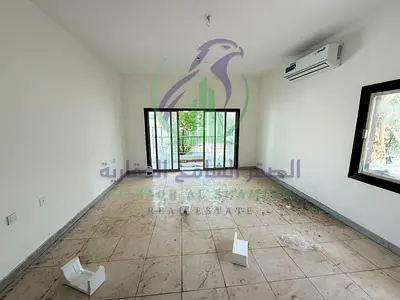 Ground floor villa unit in Al Nasiriyah with private entrance, 3 bedrooms, majlis with private bath and balcony, large yard and parking