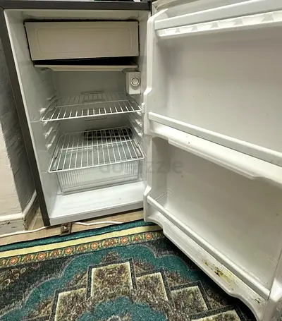Small single-door fridge with freezer compartment - used
