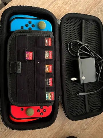 Nintendo Switch OLED with Games.