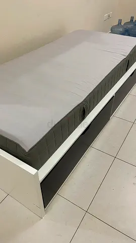 Single white daybed with storage shelves - good condition