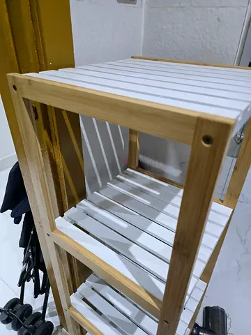 IKEA-style 3-tier wooden shelving unit with white slatted shelves