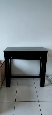 Small dark wood console table with single drawer - good condition