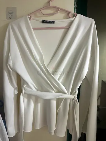 White wrap-style long sleeve blouse, size unknown — gently used- Made in Türkiye